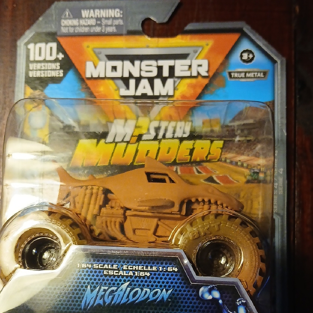Monster JAM MEGALODON MYSTERY Mudders Toy Truck - Brown.
